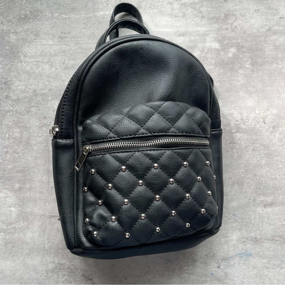 Small black studded backpack